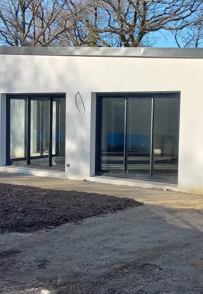 Construction Maison moderne de plain-pied 56